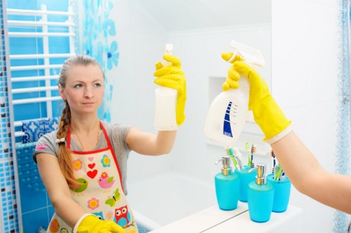 Cleaner at Shoreditch Cleaners working safely with protective equipment