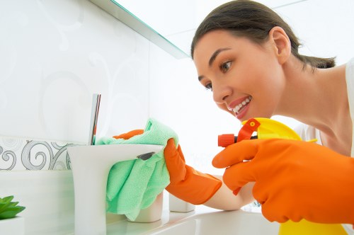 Cleaning staff following safe work practices with equipment and protective gear