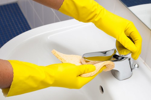 A Shoreditch cleaning specialist working in a modern East London property